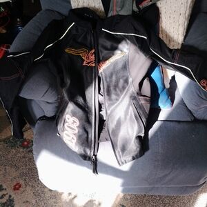 Harley-Davidson Black Jacket with Gold and Red Accents